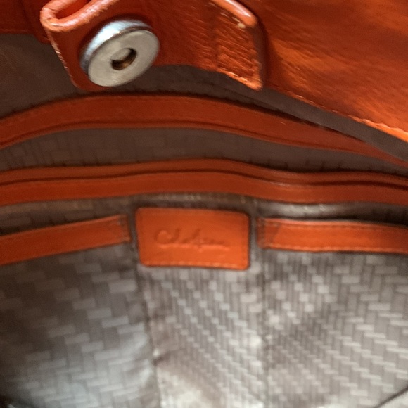 Cole Hahn orange handbag with fringe and silver hardware. - Picture 12 of 16
